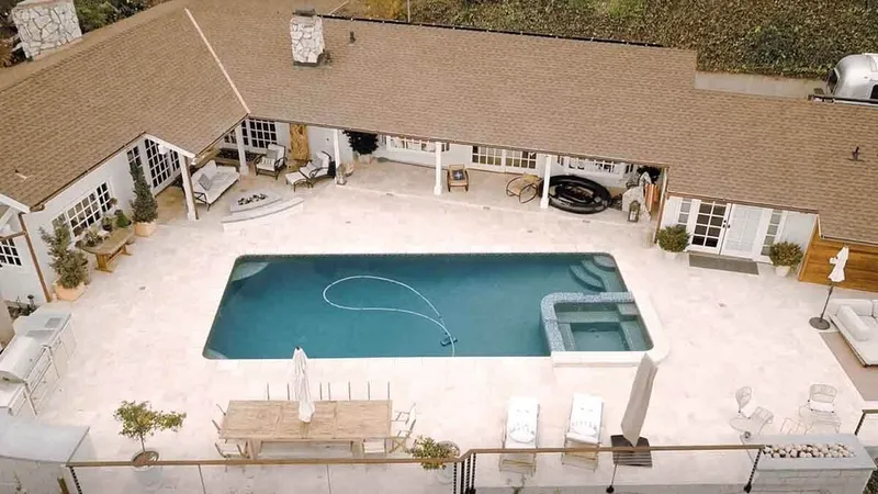 Aerial view of a travertine pool deck