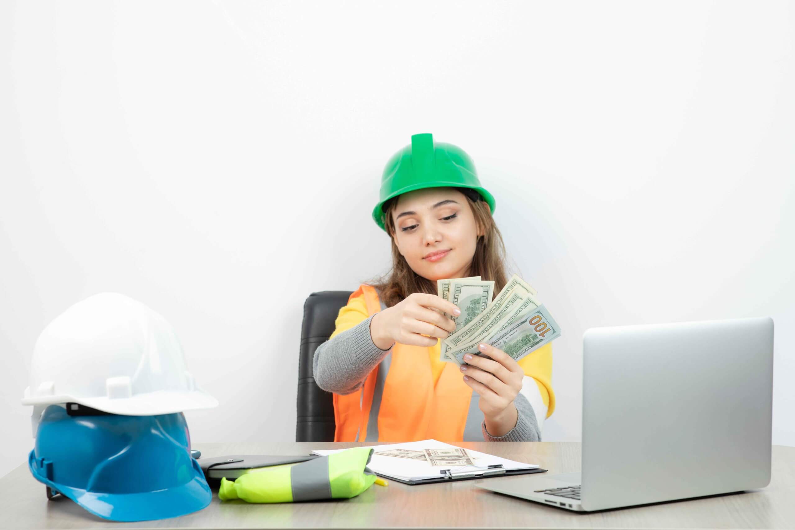 Construction worker reviewing project plans